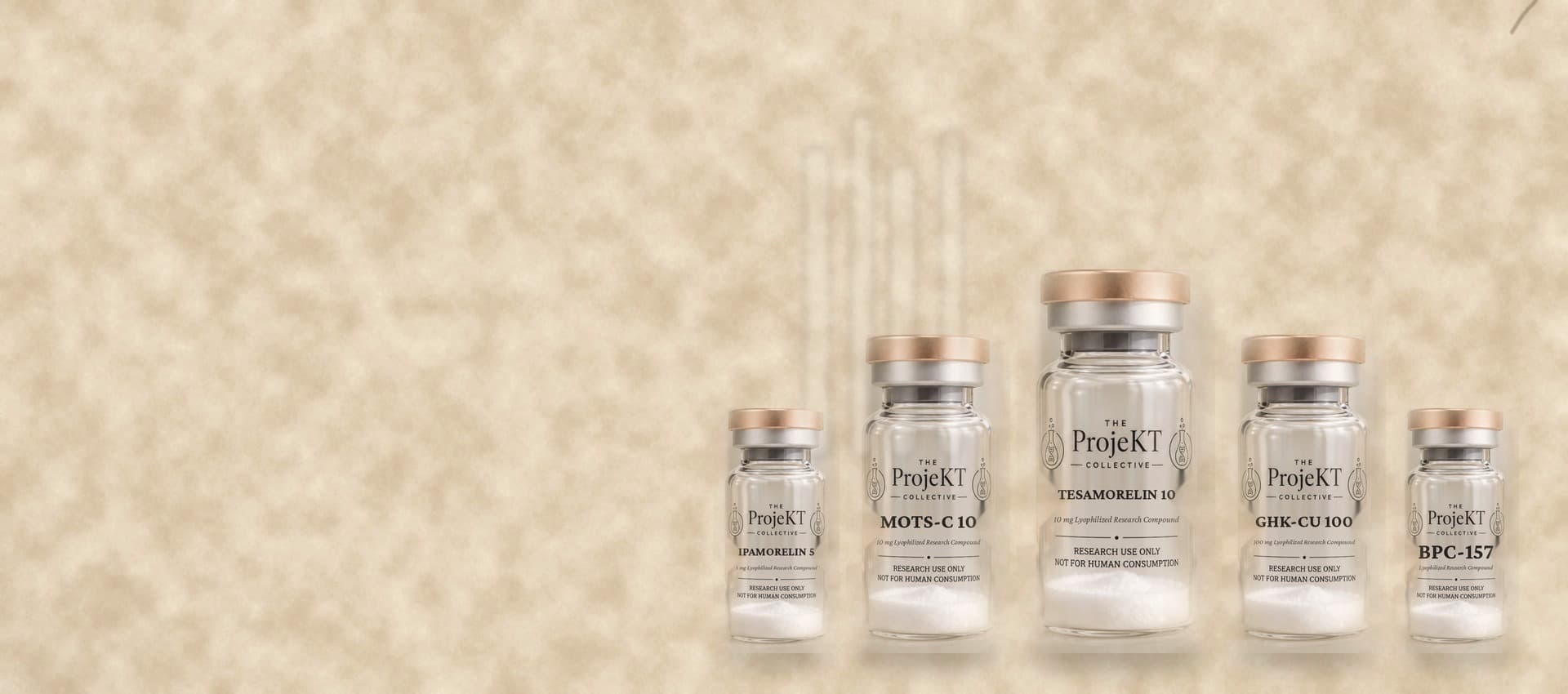 The ProjeKT Collective research peptide vials arranged on a stone surface